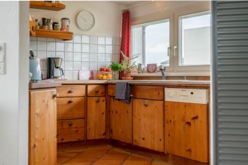 Sofort verfügbar: 3-Zimmer-Dachgeschosswohnung in Lauterach - Blick in die Küche